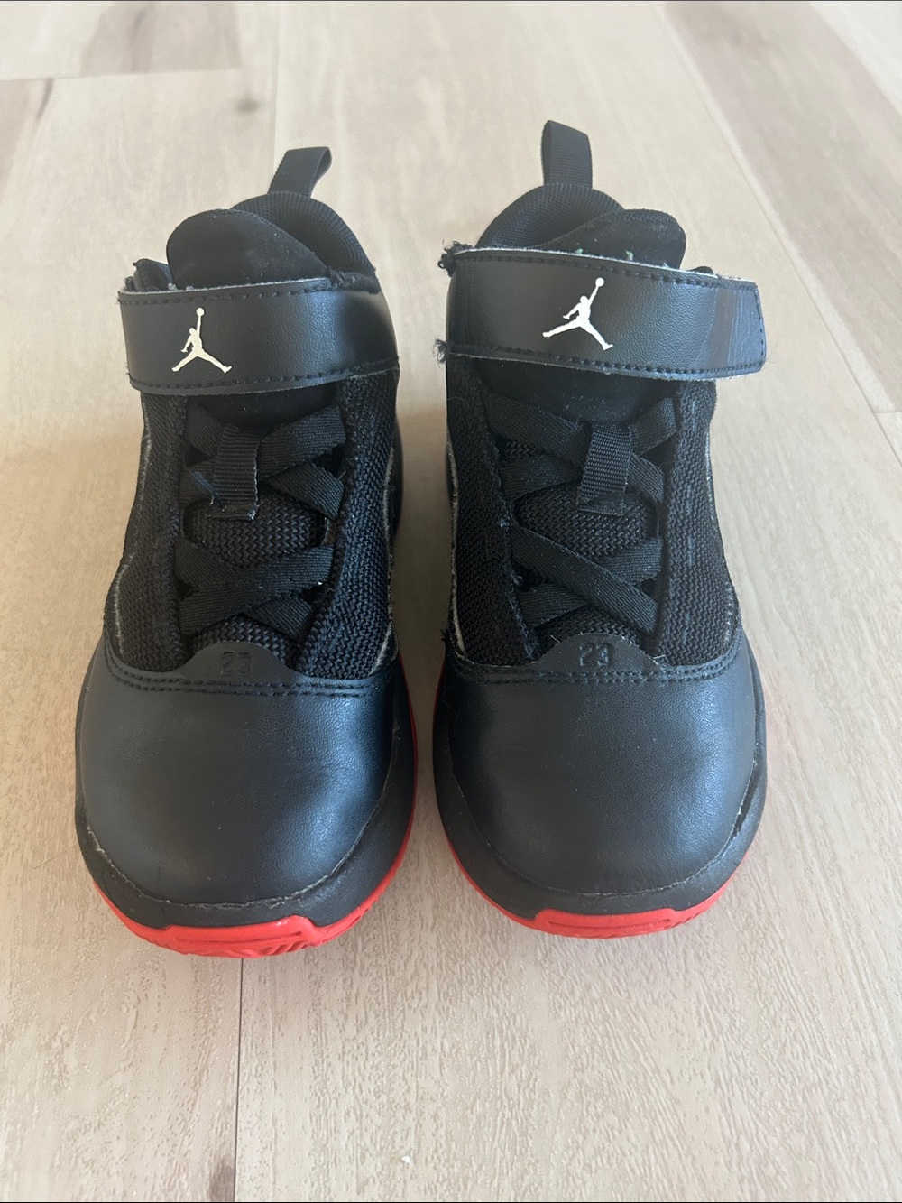 Jordan Kids Black and Red Mid-Top Sneakers with Jumpman Strap